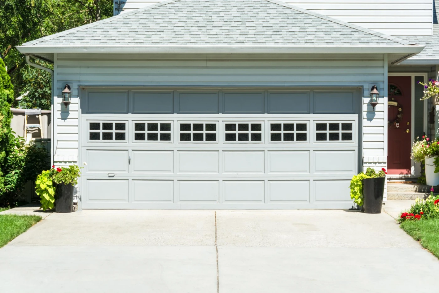 Professional garage door technician working in Tampa FL
